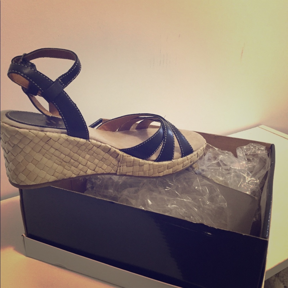 Wedge dress sandal with black leather straps